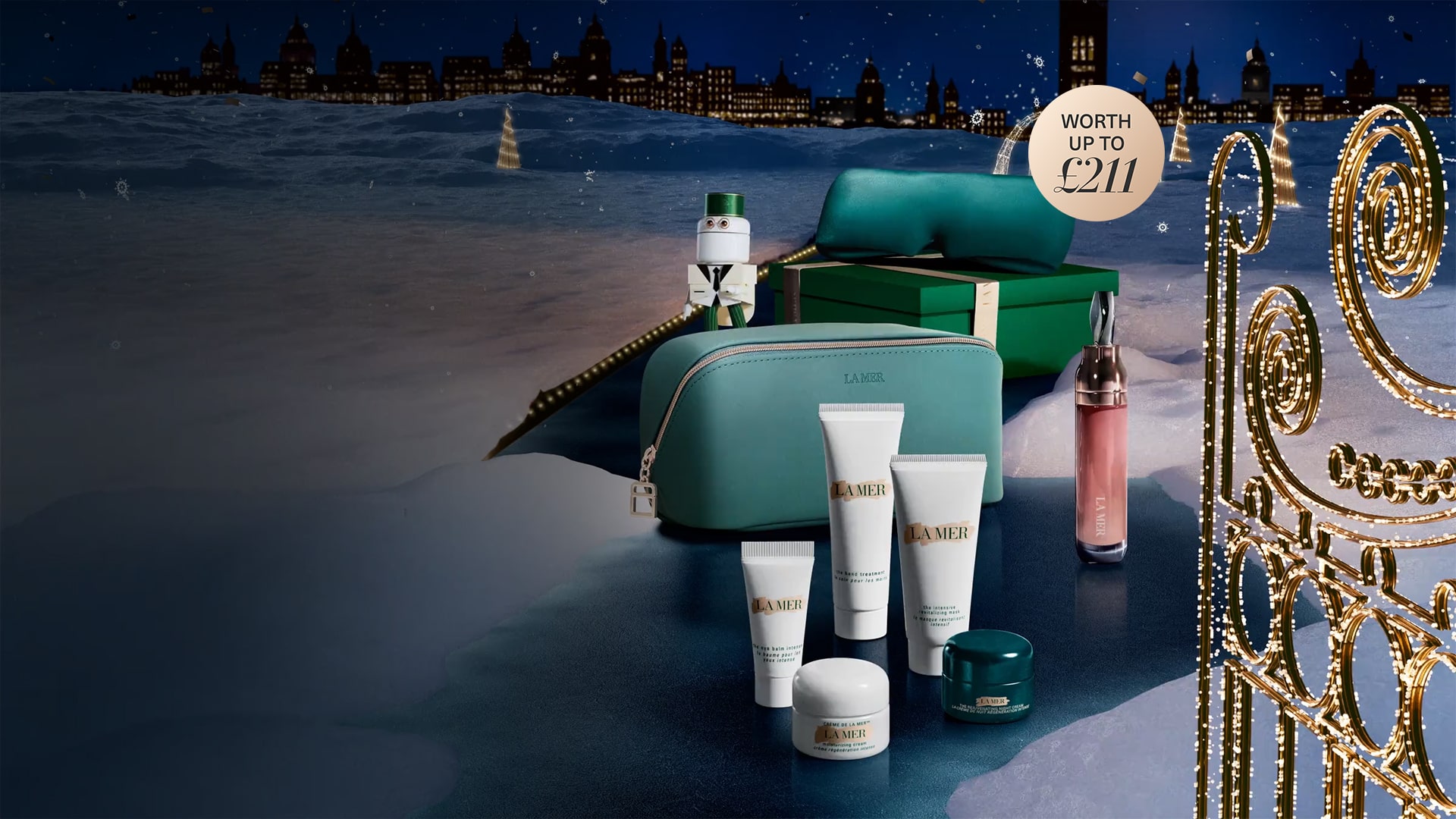 Selection of La Mer minis, eye mask and a full size lip treatment in a winter oasis, with snow falling from the night sky