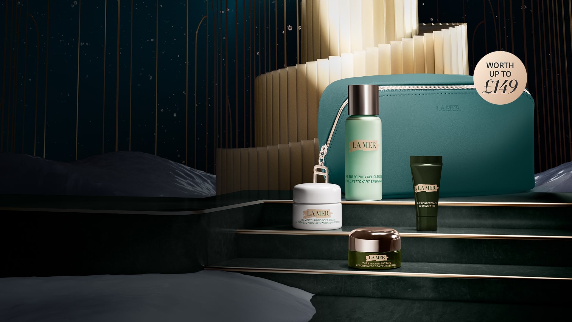 Selection of La Mer minis, eye mask and a full size lip treatment in a winter oasis, with snow falling from the night sky