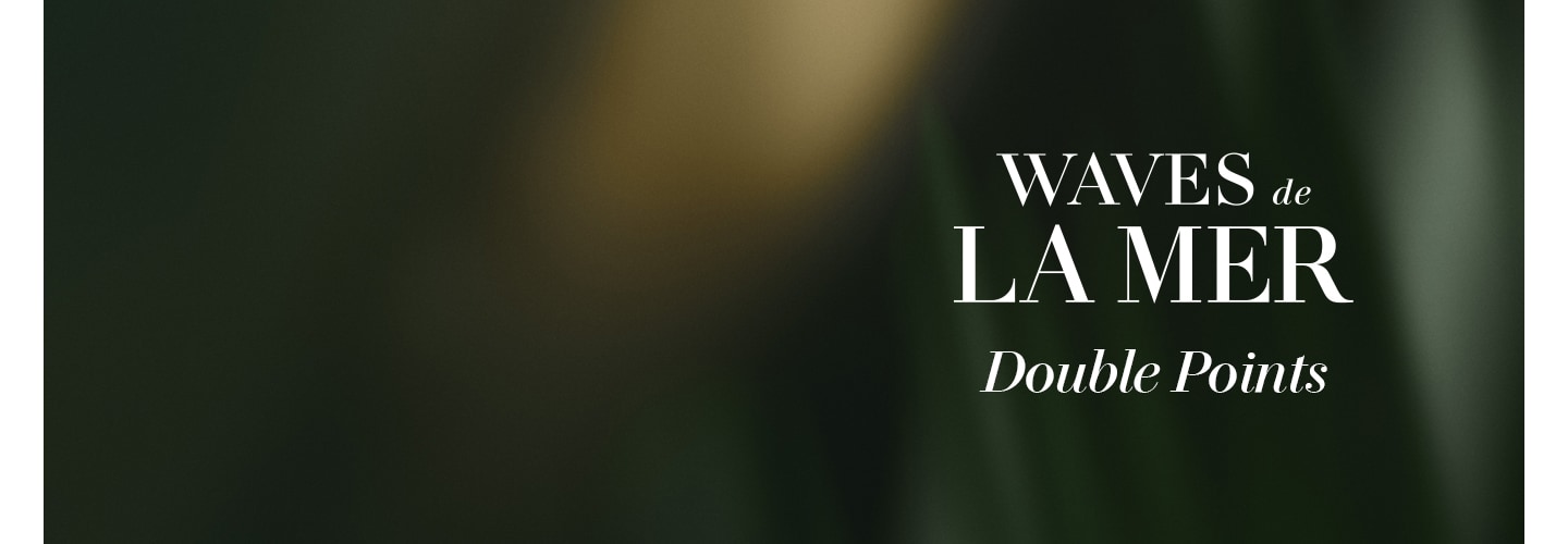 Waves de La Mer logo over an ambient green and gold gradient with glitter animation