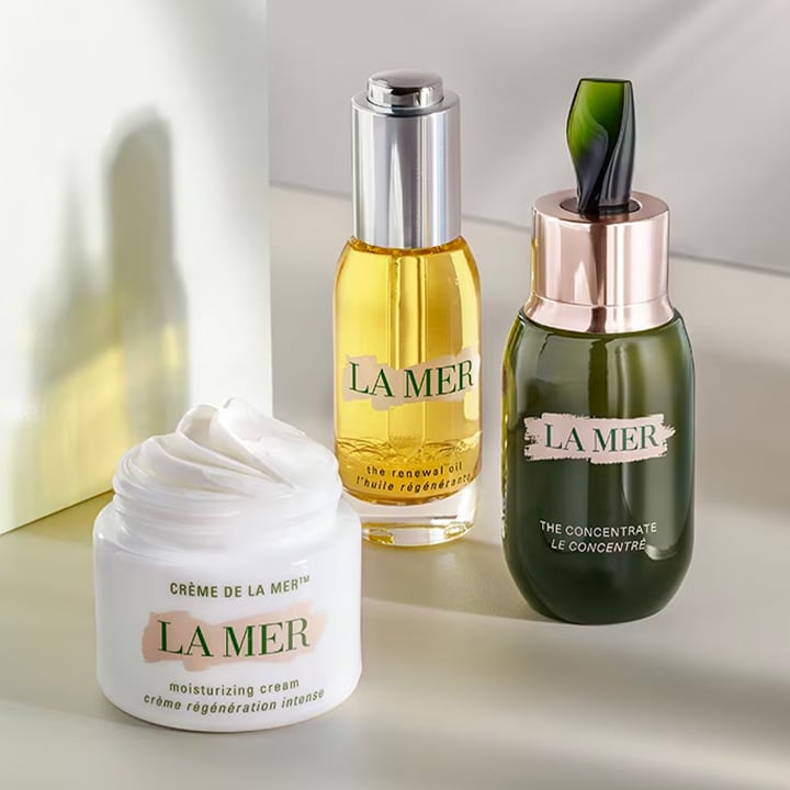 Close up of Creme de la Mer, The Concentrate and The Renewal Oil products