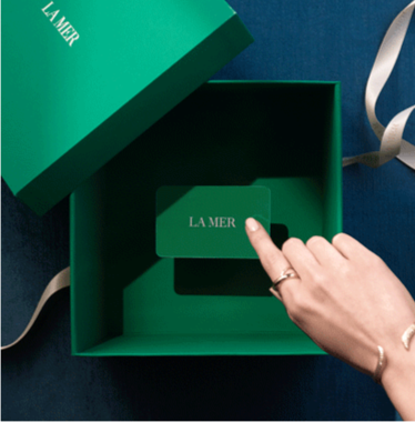 green gift card in a green box